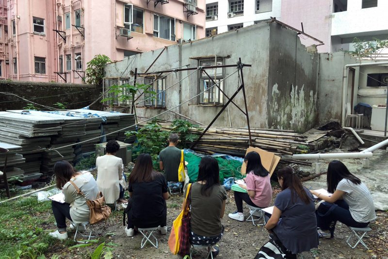 Zheng Bo leads a walk with AAA team in Sheung Wan and Central, observing and drawing weeds between the cracks, Image: Courtesy the artist. Zheng Bo Workshop